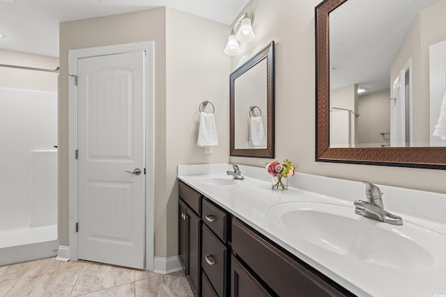 bathroom with vanity and tile patterned floors