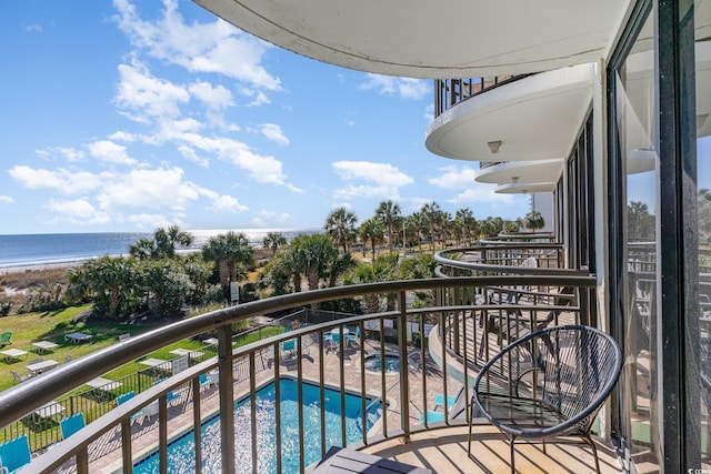 balcony featuring a water view