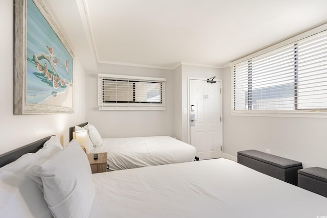 bedroom featuring crown molding