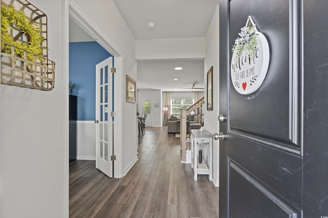 entrance foyer featuring ceiling fan and dark hardwood / wood-style flooring