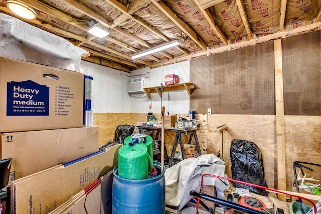 storage room with an AC wall unit