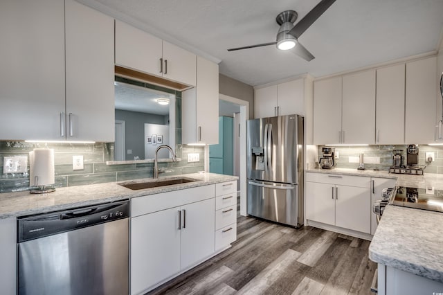 kitchen featuring white cabinetry, sink, ceiling fan, and appliances with stainless steel finishes