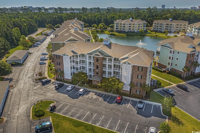 drone / aerial view with a water view