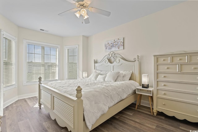 bedroom featuring hardwood / wood-style flooring and ceiling fan