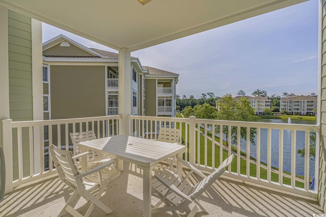 balcony featuring a water view