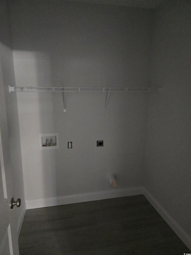 laundry area featuring dark hardwood / wood-style floors, hookup for a washing machine, and hookup for an electric dryer