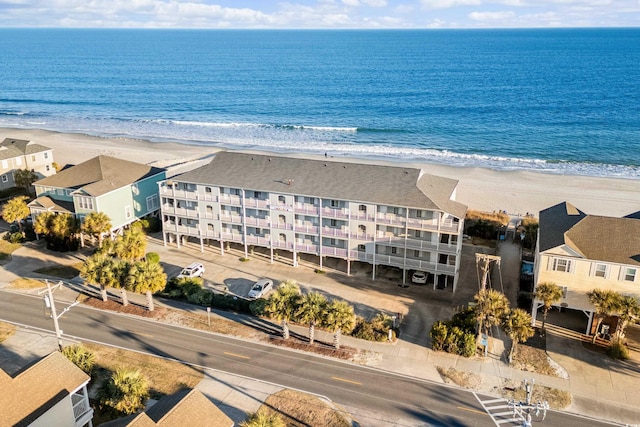 aerial view with a beach view and a water view