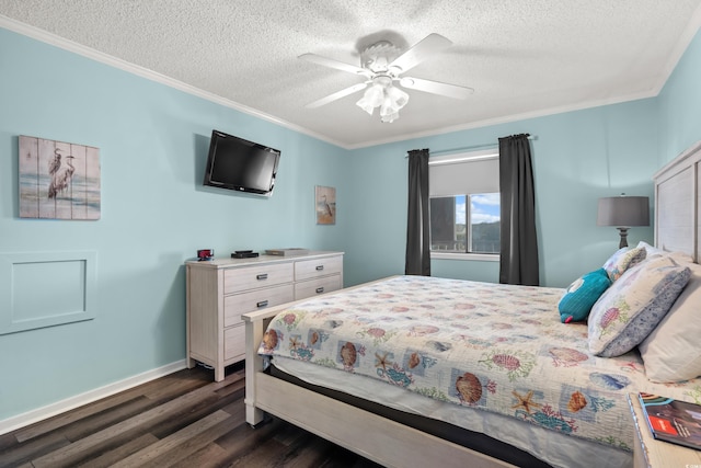 bedroom with a textured ceiling, dark wood-type flooring, ceiling fan, and crown molding