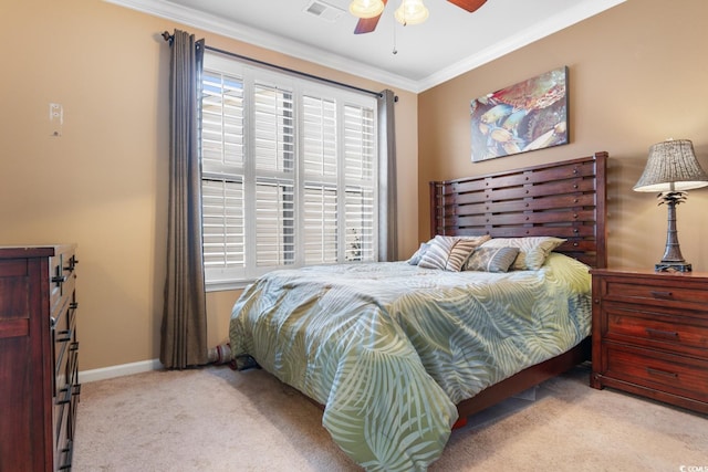 bedroom featuring light colored carpet, ceiling fan, and ornamental molding