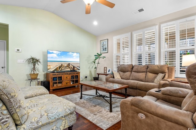 living room featuring ceiling fan, dark hardwood / wood-style flooring, and lofted ceiling