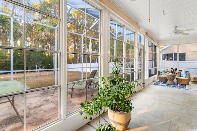 sunroom / solarium with ceiling fan