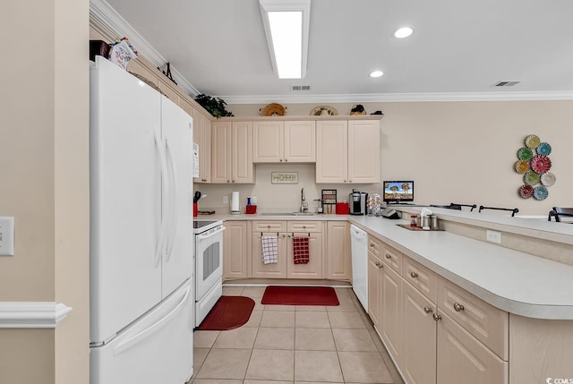 kitchen with light tile patterned flooring, white appliances, ornamental molding, and kitchen peninsula