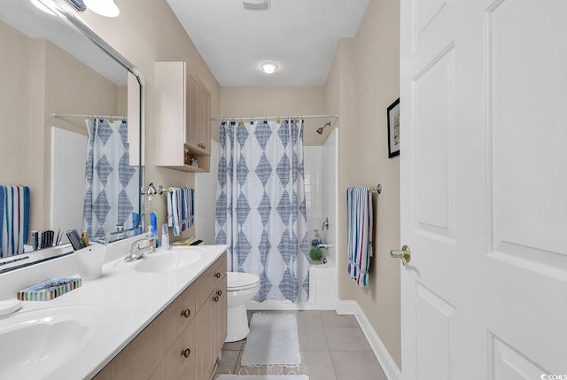 full bathroom with shower / tub combo with curtain, vanity, toilet, and tile patterned flooring