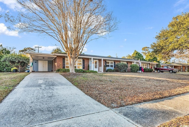 ranch-style house with a carport