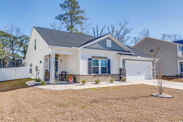 view of front facade with a front yard and a garage