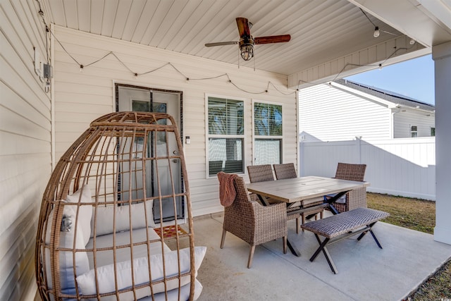 view of patio / terrace featuring ceiling fan