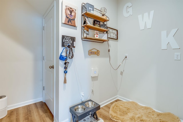 interior space with hardwood / wood-style flooring