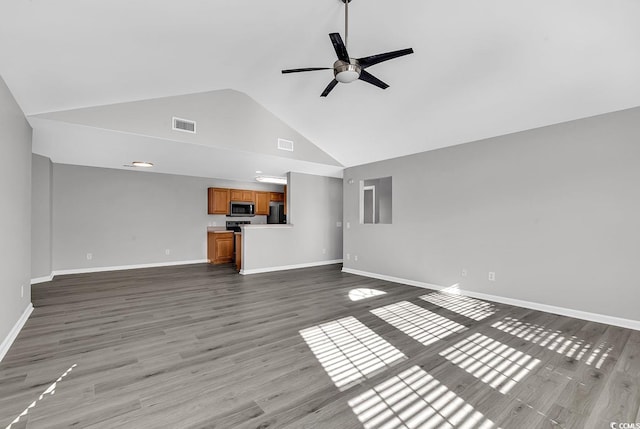 unfurnished living room featuring ceiling fan, hardwood / wood-style floors, and high vaulted ceiling