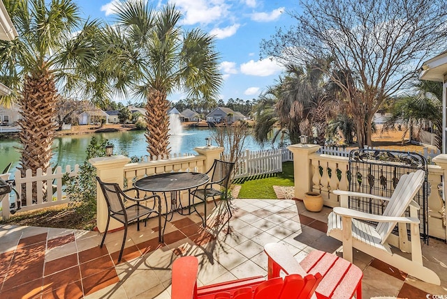 view of patio / terrace featuring a water view