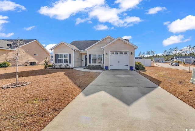 ranch-style home with a front lawn, a garage, and central AC