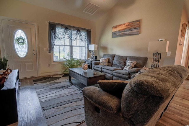 141 Baylee Cir, Galivants Ferry, SC 29544 - living room with wood finished floors, baseboards, and vaulted ceiling