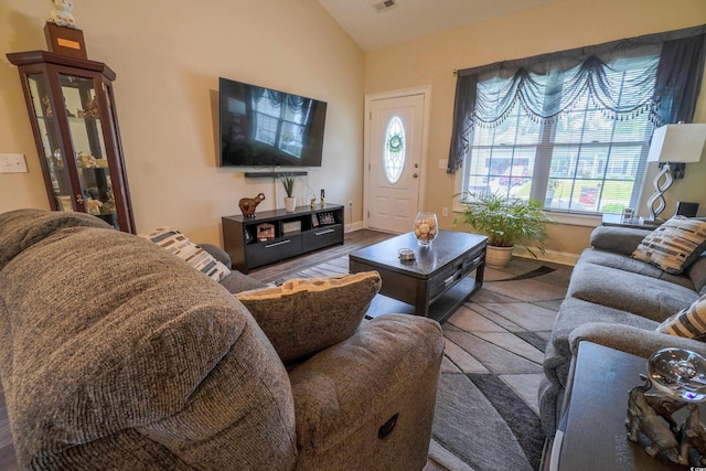 141 Baylee Cir, Galivants Ferry, SC 29544 - living room featuring lofted ceiling, baseboards, and wood finished floors