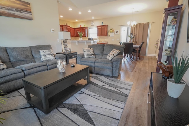 141 Baylee Cir, Galivants Ferry, SC 29544 - living area with light wood-style floors, recessed lighting, and a chandelier