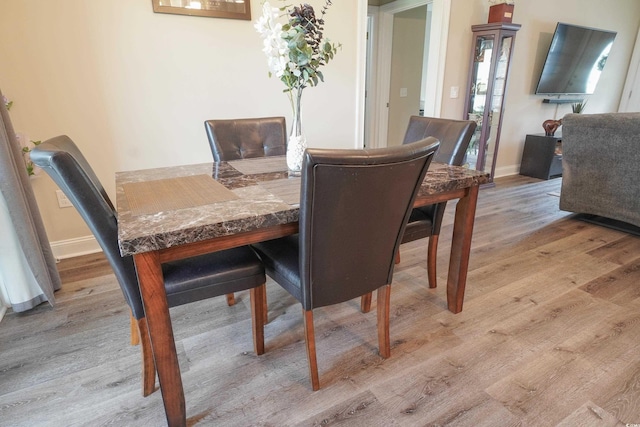 141 Baylee Cir, Galivants Ferry, SC 29544 - dining space featuring light wood-type flooring and baseboards