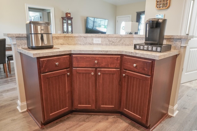 141 Baylee Cir, Galivants Ferry, SC 29544 - kitchen featuring light countertops, light wood-style flooring, a breakfast bar area, and a center island