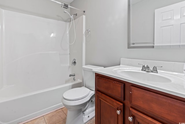 full bathroom with bathtub / shower combination, tile patterned floors, vanity, and toilet