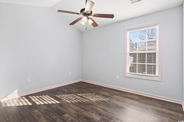 unfurnished room featuring vaulted ceiling, ceiling fan, and dark hardwood / wood-style flooring