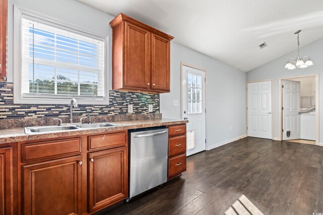 kitchen with lofted ceiling, backsplash, dishwasher, a notable chandelier, and sink