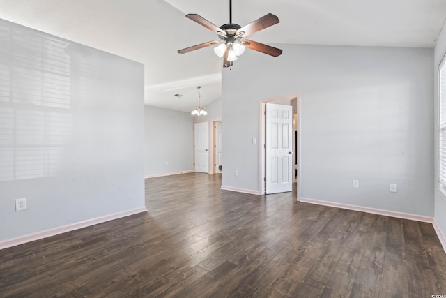 unfurnished room with lofted ceiling, dark hardwood / wood-style flooring, and ceiling fan with notable chandelier