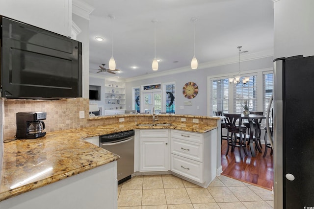 kitchen featuring white cabinetry, appliances with stainless steel finishes, kitchen peninsula, and sink