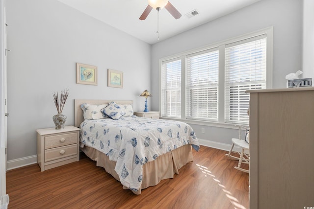 bedroom featuring wood-type flooring and ceiling fan