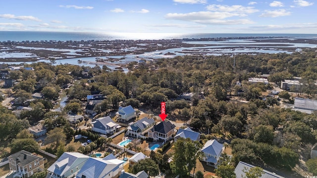 bird's eye view with a water view