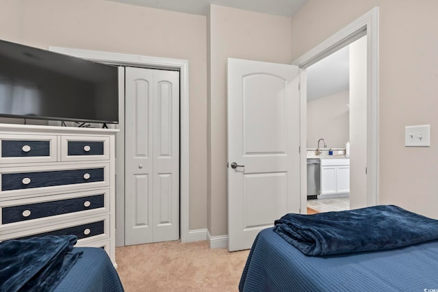 carpeted bedroom with a closet