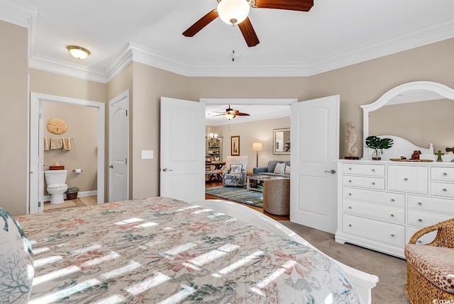 carpeted bedroom featuring crown molding, connected bathroom, and ceiling fan