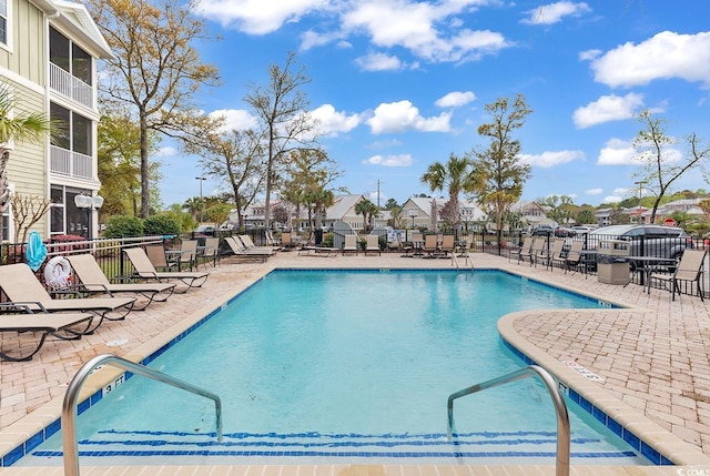 view of swimming pool featuring a patio