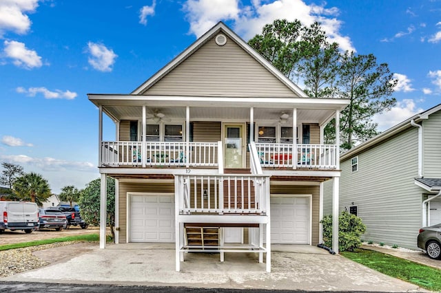 view of front of home featuring a porch and a garage