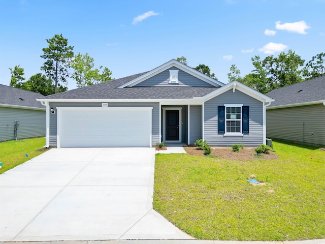 ranch-style house with a garage and a front yard