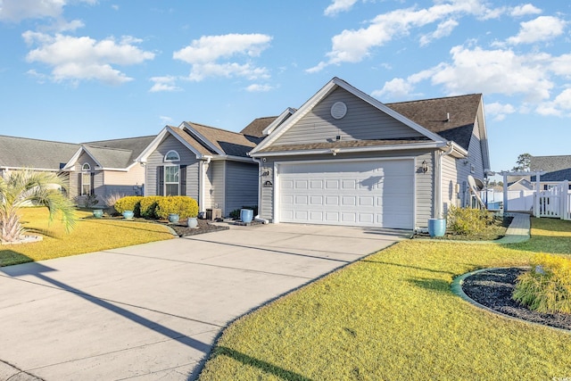 ranch-style house with a front yard and a garage