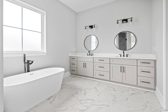 bathroom with vanity and a tub to relax in