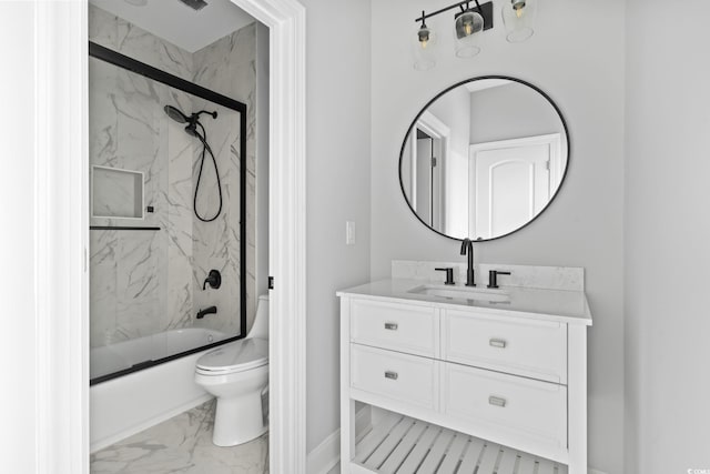 full bathroom with vanity, enclosed tub / shower combo, and toilet