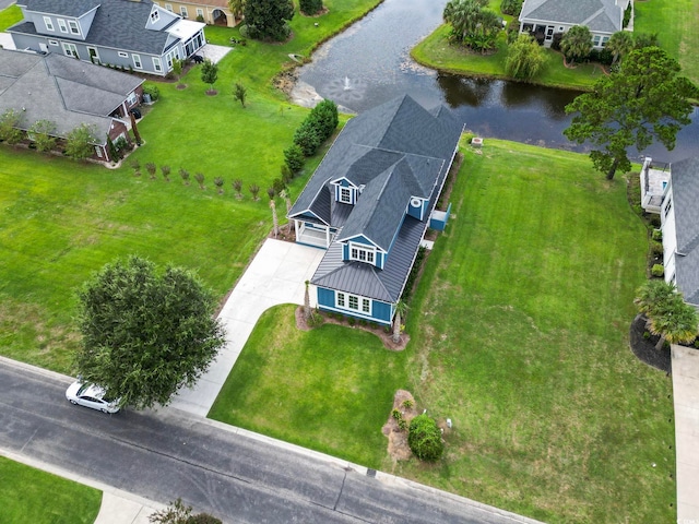 drone / aerial view with a water view