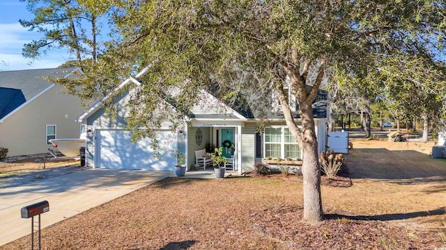 view of front of home featuring a garage and central air condition unit