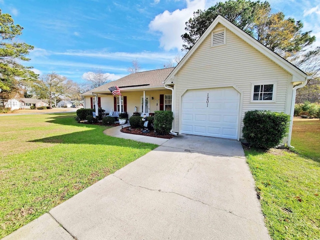 ranch-style house featuring a front yard, a porch, and a garage