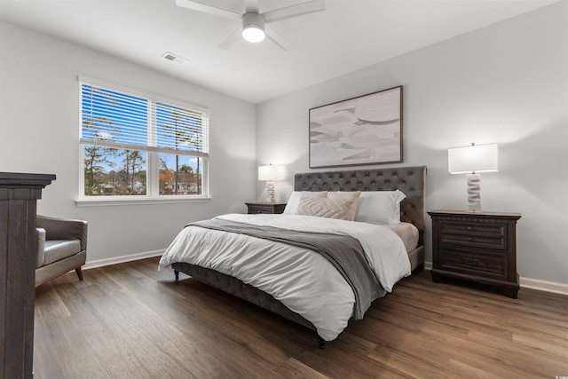 bedroom with hardwood / wood-style floors and ceiling fan