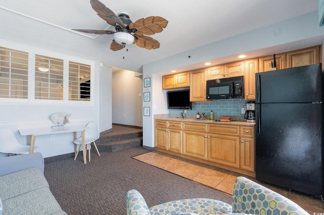 4800 S Ocean Blvd Unit 1007, North Myrtle Beach, SC 29582 - kitchen featuring black appliances, ceiling fan, decorative backsplash, light carpet, and recessed lighting