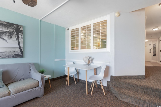 4800 S Ocean Blvd Unit 1007, North Myrtle Beach, SC 29582 - carpeted dining area with baseboards